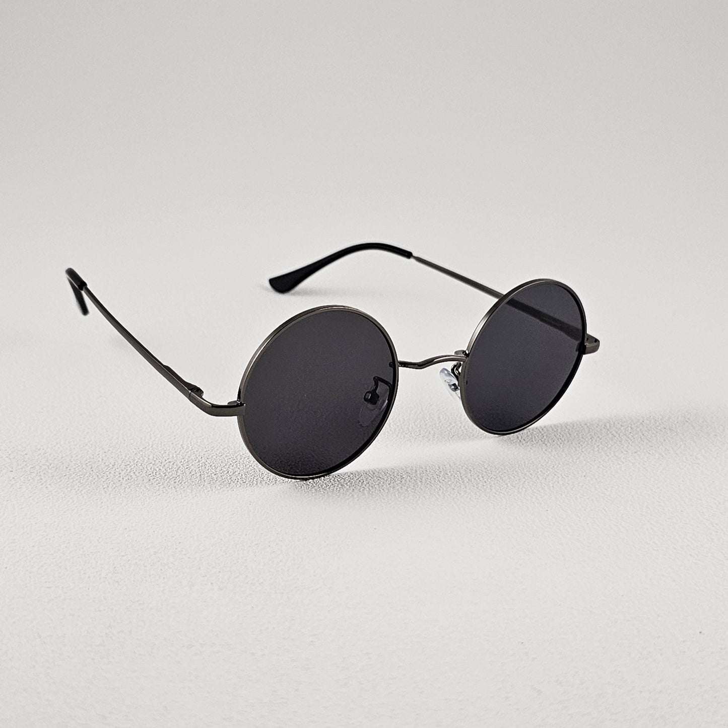 Unisex Ozzy round sunglasses side view black metal frame UV400 lenses