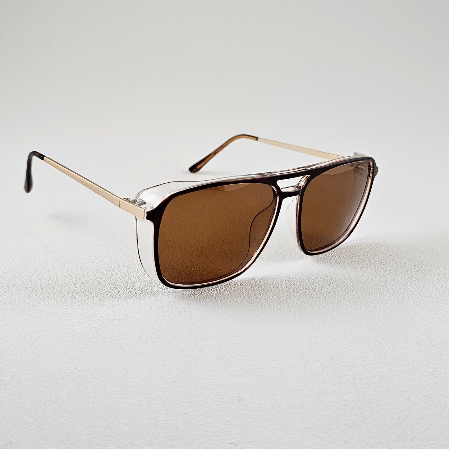 Angled view geometric polarized sunglasses with TAC lenses and UV protection