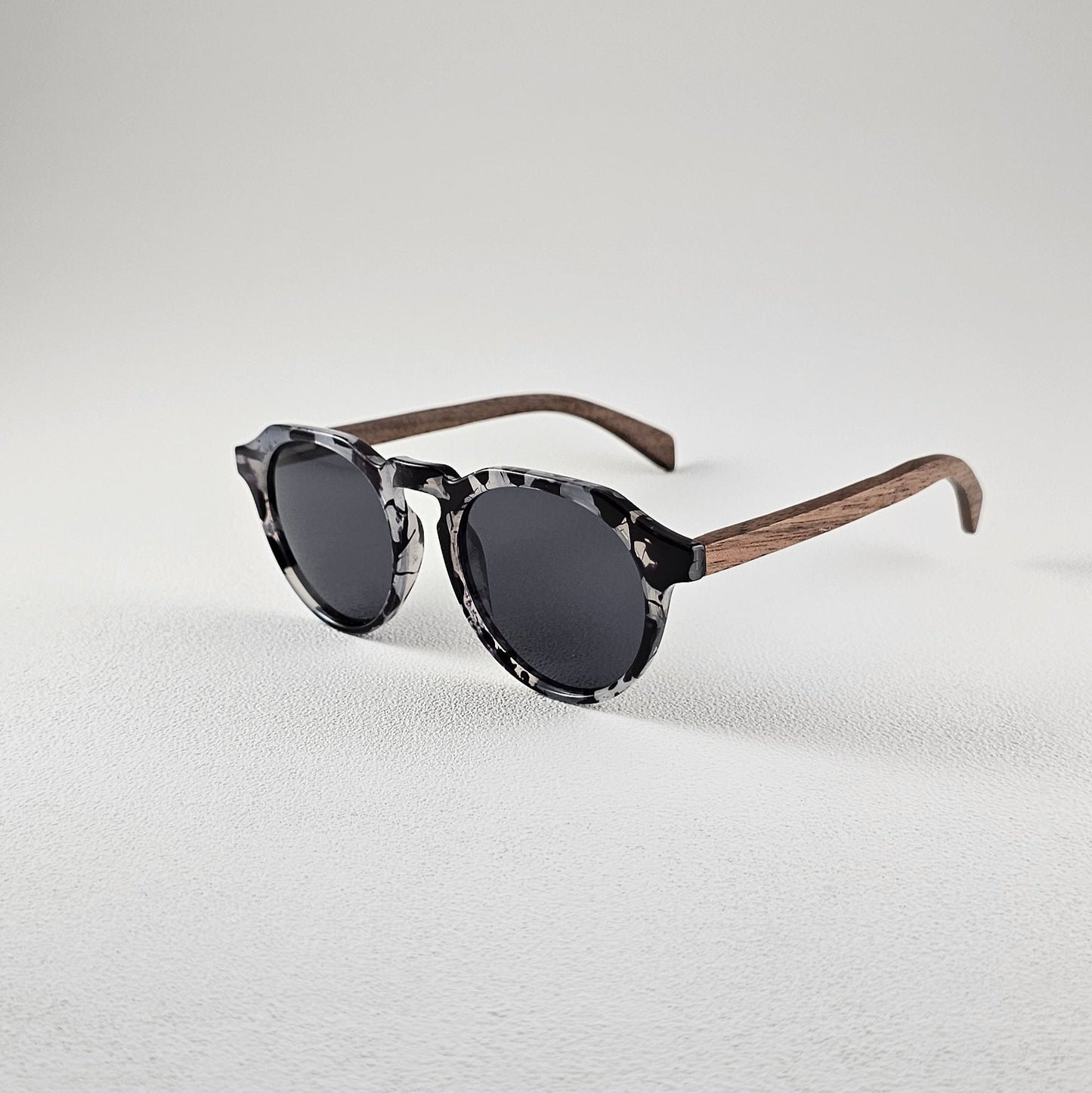 Angled view geometric polarized sunglasses with TAC lenses and UV protection