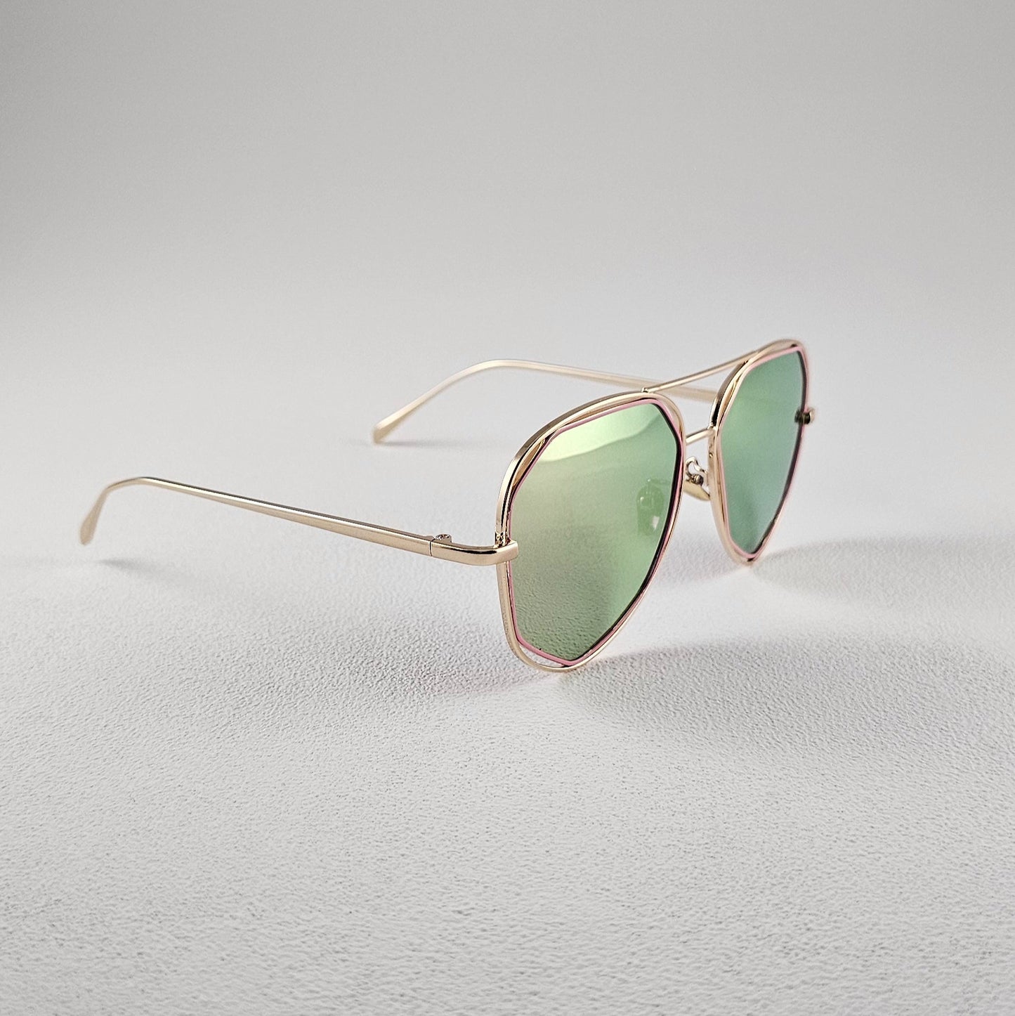 Side profile pink polarized geometric sunglasses – durable metal frame
