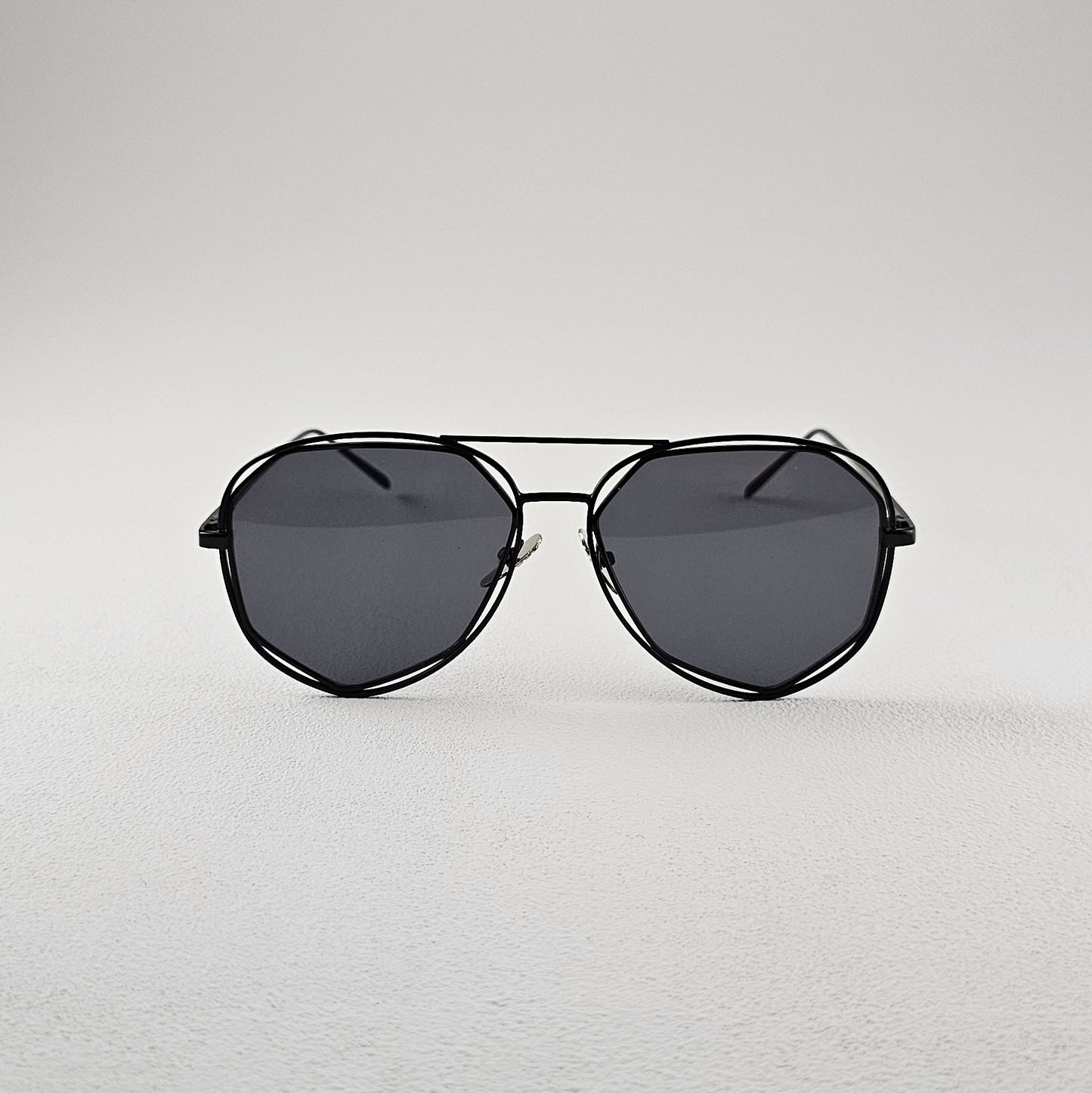Black geometric polarized sunglasses with UV protection – metal frame front view