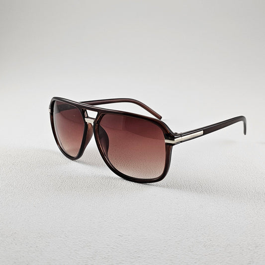 Angled view brown polarized geometric sunglasses with AC lenses and UV protection