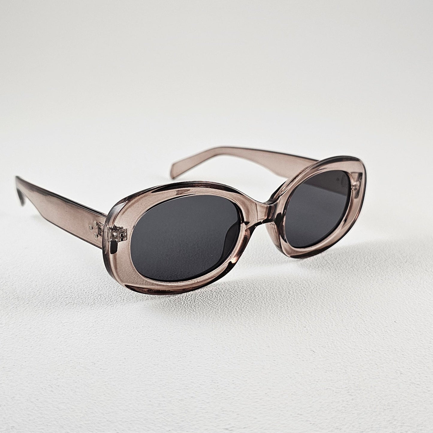 Women's Lisboa oval sunglasses brown bold frame side view UV400 lenses