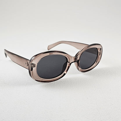 Women's Lisboa oval sunglasses brown bold frame side view UV400 lenses