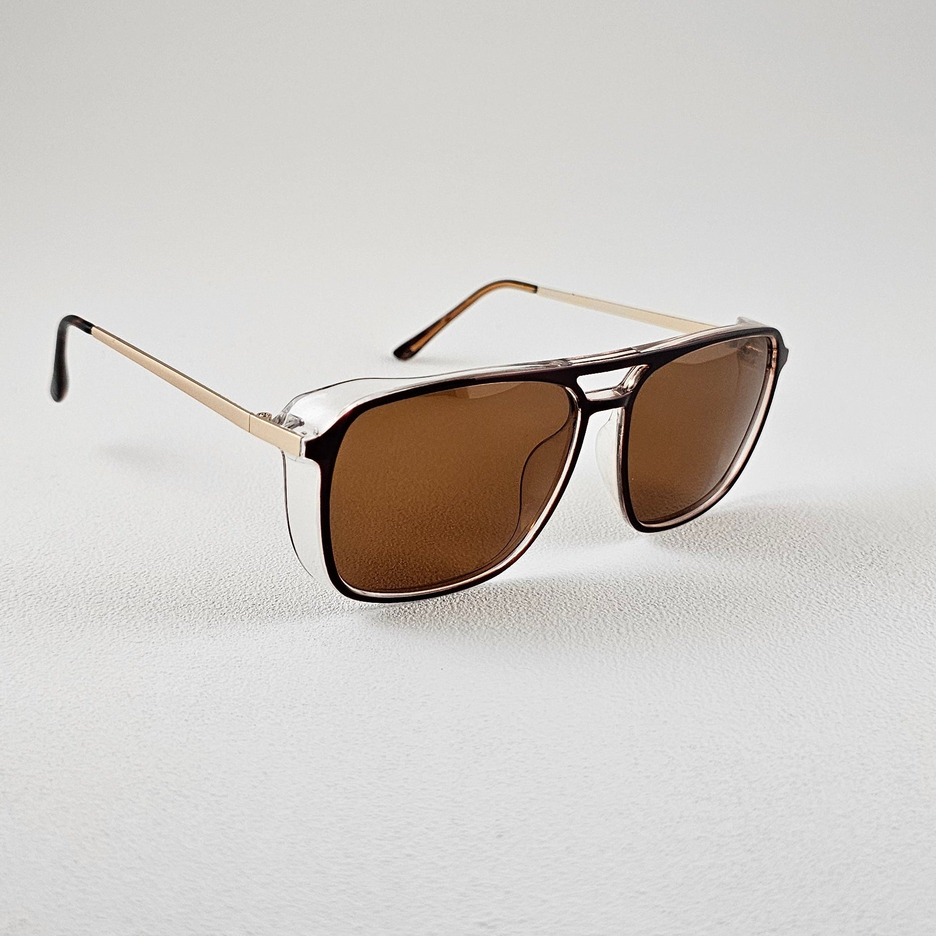 Angled view geometric polarized sunglasses with TAC lenses and UV protection