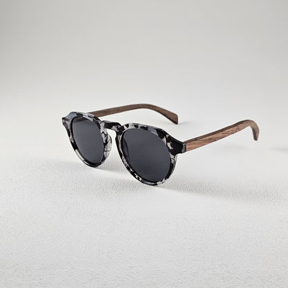 Angled view geometric polarized sunglasses with TAC lenses and UV protection