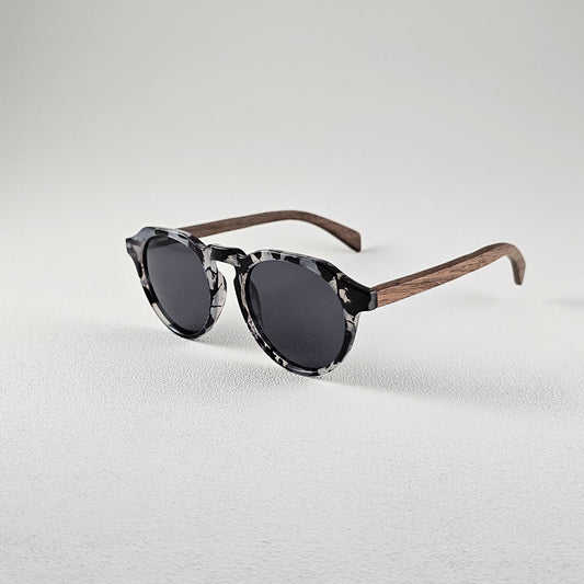 Angled view geometric polarized sunglasses with TAC lenses and UV protection