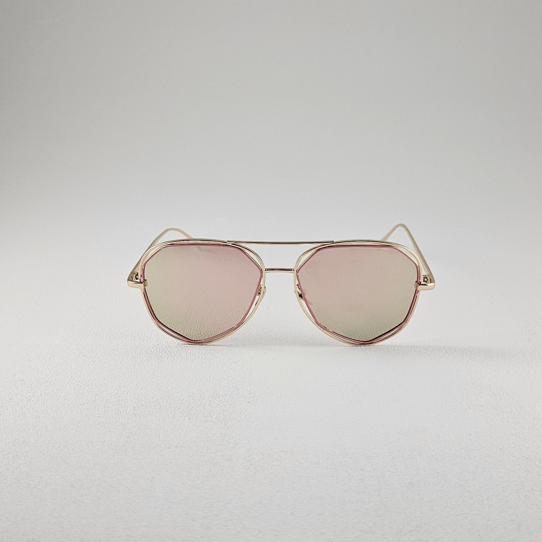 Pink geometric polarized sunglasses with UV protection – metal frame front view