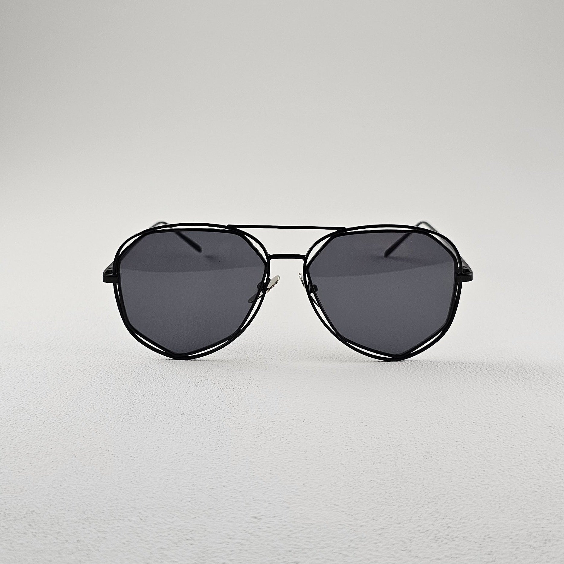 Black geometric polarized sunglasses with UV protection – metal frame front view