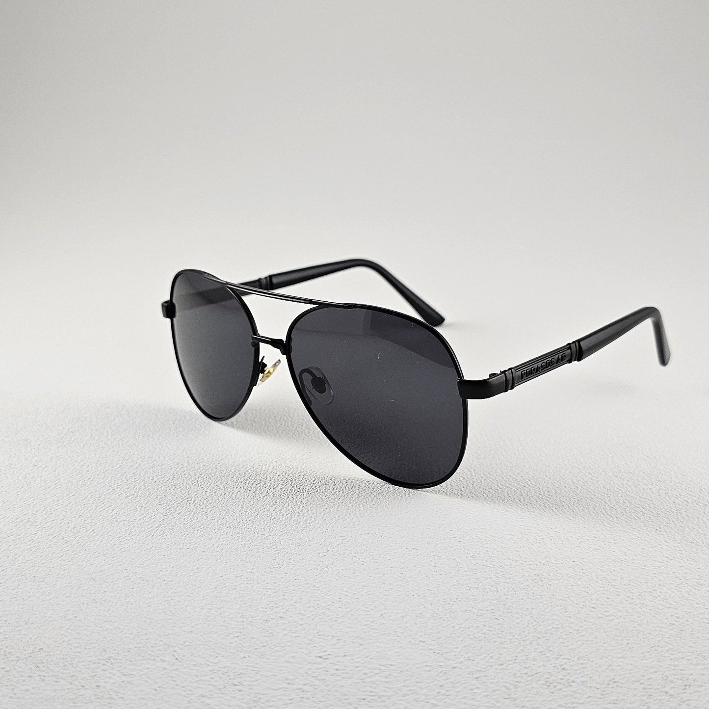 Angled view black polarized pilot sunglasses with TAC lenses and UV protection