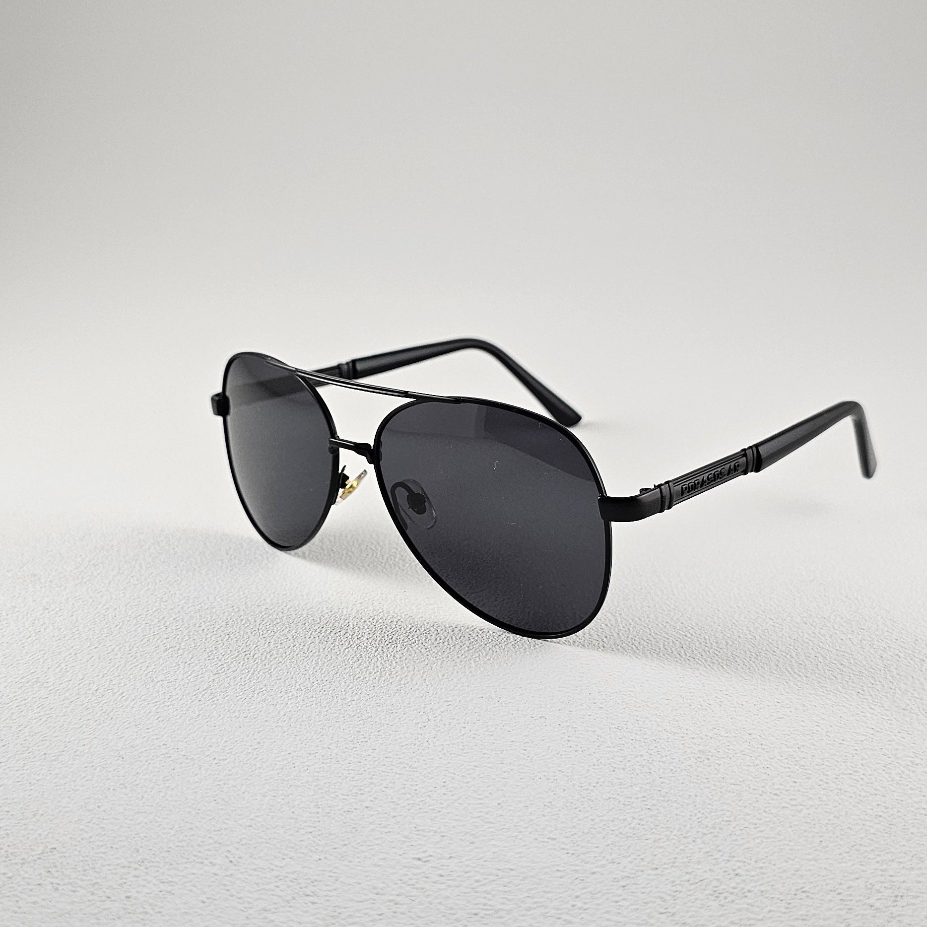 Angled view black polarized pilot sunglasses with TAC lenses and UV protection